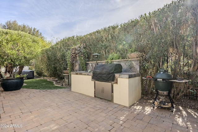 view of patio featuring area for grilling and grilling area