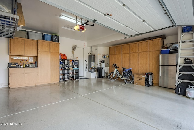 garage featuring stainless steel fridge, a garage door opener, and water heater