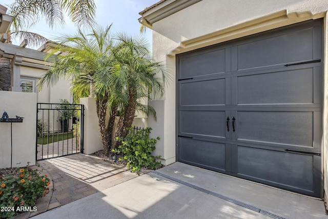 entrance to property featuring a garage