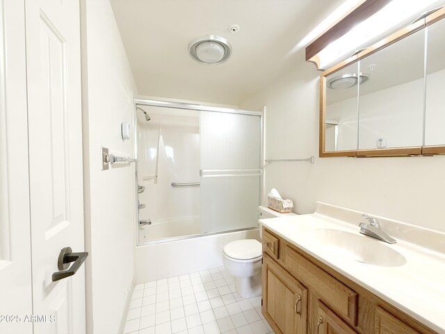 10330 W Thunderbird Blvd Unit C304, Sun City, AZ 85351 - full bathroom featuring toilet, tile patterned floors, shower / bath combination with glass door, and vanity