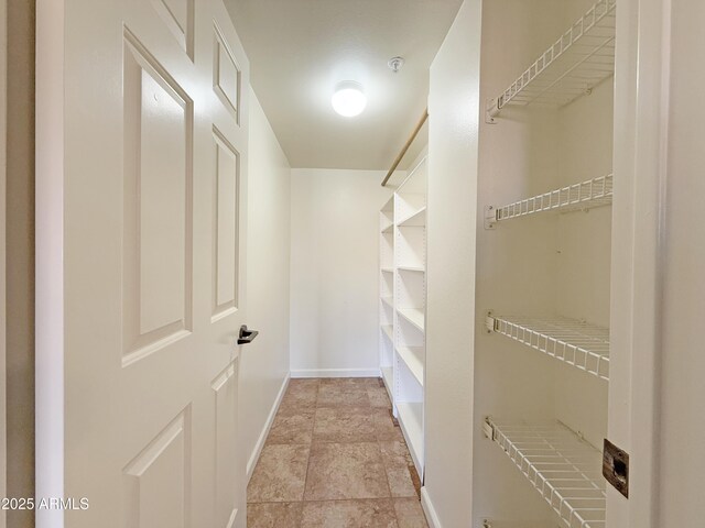 10330 W Thunderbird Blvd Unit C304, Sun City, AZ 85351 - spacious closet with stone finish floor