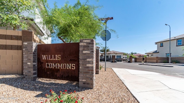 community / neighborhood sign featuring a residential view