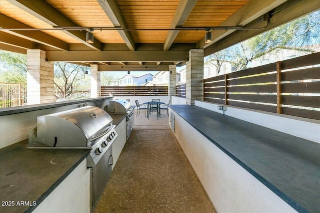 view of patio / terrace with area for grilling and a grill