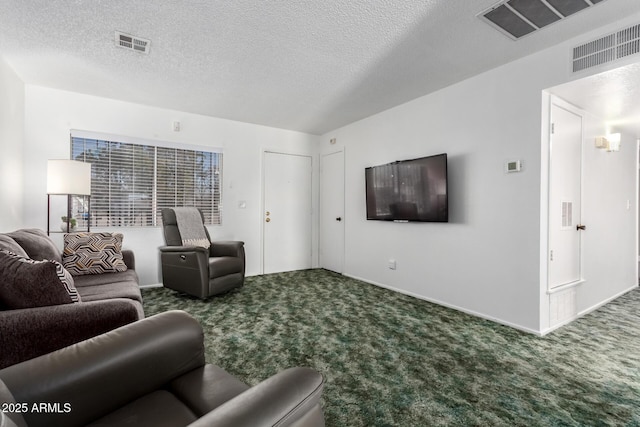 carpeted living room with baseboards, visible vents, and a textured ceiling