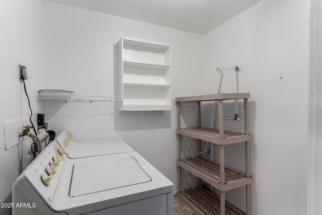 laundry area with laundry area and separate washer and dryer