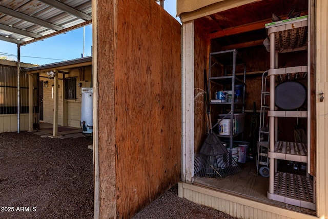 exterior space with gas water heater