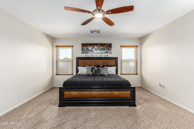 bedroom featuring ceiling fan and carpet flooring