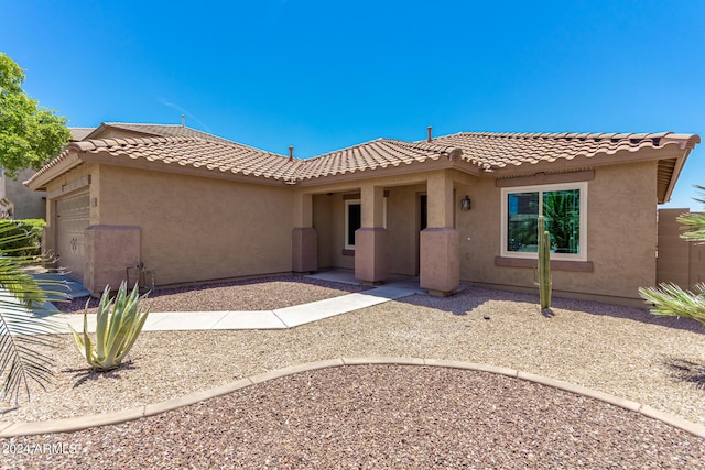 view of front of home featuring a garage