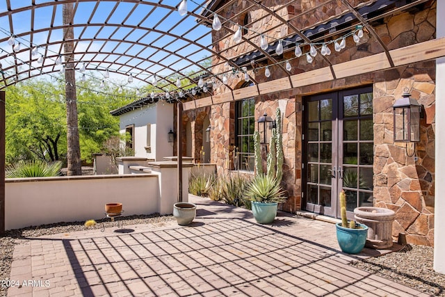 view of patio / terrace featuring french doors