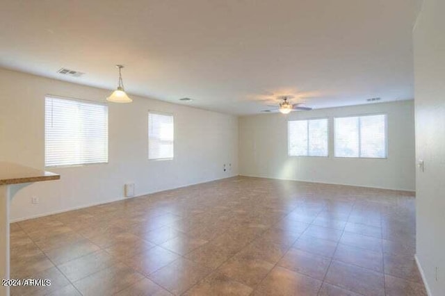 spare room featuring ceiling fan