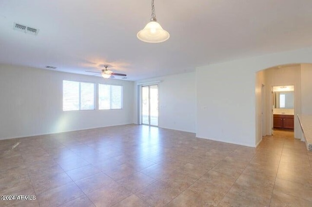 spare room featuring ceiling fan