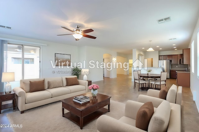 living room with ceiling fan