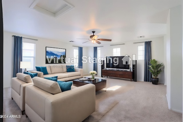 living room featuring ceiling fan and light carpet