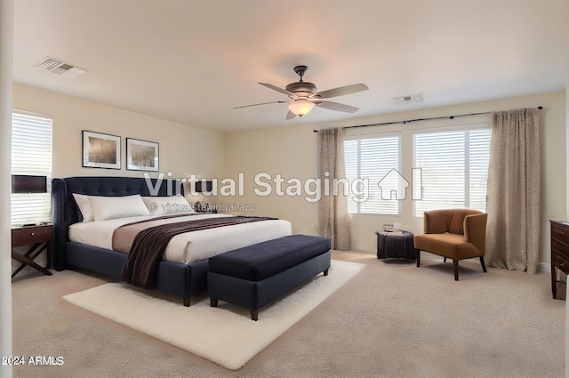 carpeted bedroom featuring ceiling fan