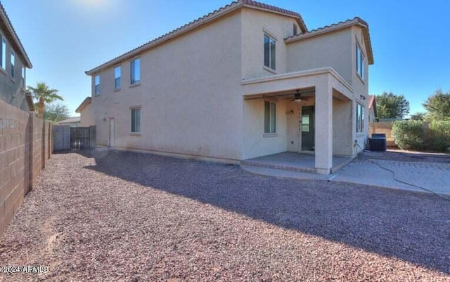 rear view of property with a patio