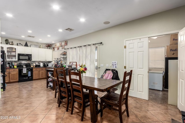 view of tiled dining space