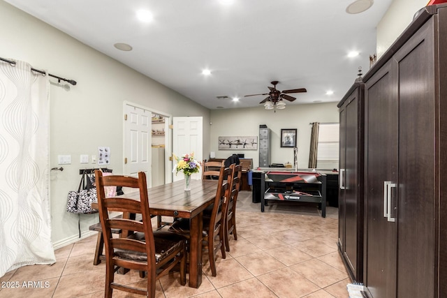 dining room with ceiling fan and light tile patterned floors