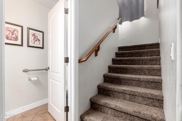 stairs with tile patterned floors