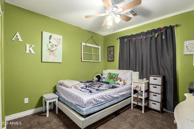 bedroom featuring ceiling fan and dark colored carpet