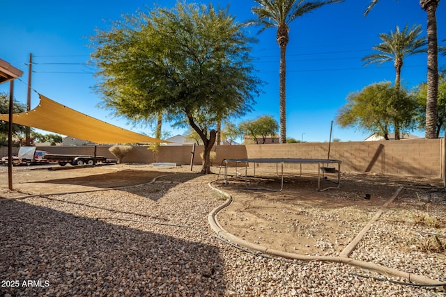 view of yard with a trampoline