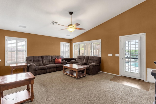 11101 W Wilshire Dr, Avondale, AZ 85392 - living room featuring carpet, healthy amount of natural light, ceiling fan, and lofted ceiling