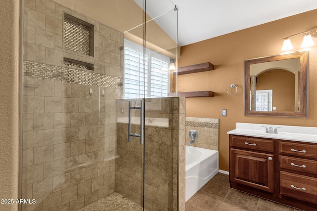 11101 W Wilshire Dr, Avondale, AZ 85392 - bathroom with a shower stall, a bath, vanity, and tile patterned floors