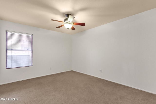 11101 W Wilshire Dr, Avondale, AZ 85392 - spare room with ceiling fan, carpet floors, and baseboards