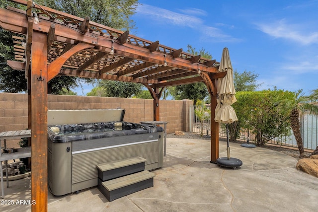 11101 W Wilshire Dr, Avondale, AZ 85392 - view of patio / terrace featuring fence, a hot tub, and a pergola