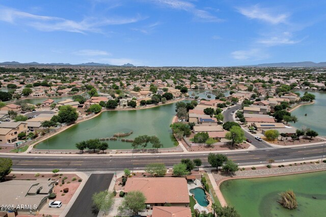 11101 W Wilshire Dr, Avondale, AZ 85392 - aerial perspective of suburban area with a water and mountain view