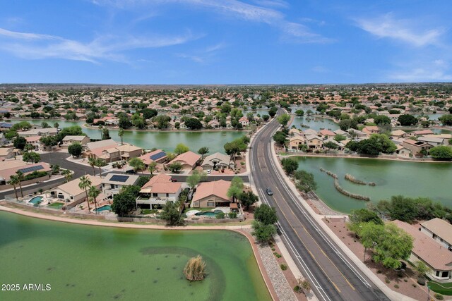 11101 W Wilshire Dr, Avondale, AZ 85392 - aerial perspective of suburban area with a nearby body of water