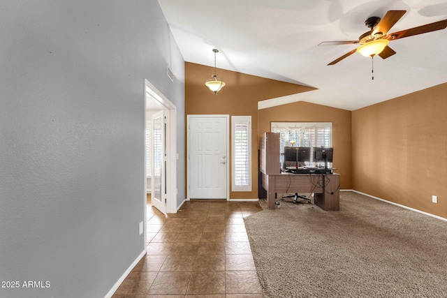 11101 W Wilshire Dr, Avondale, AZ 85392 - tiled entryway with lofted ceiling, a ceiling fan, and baseboards