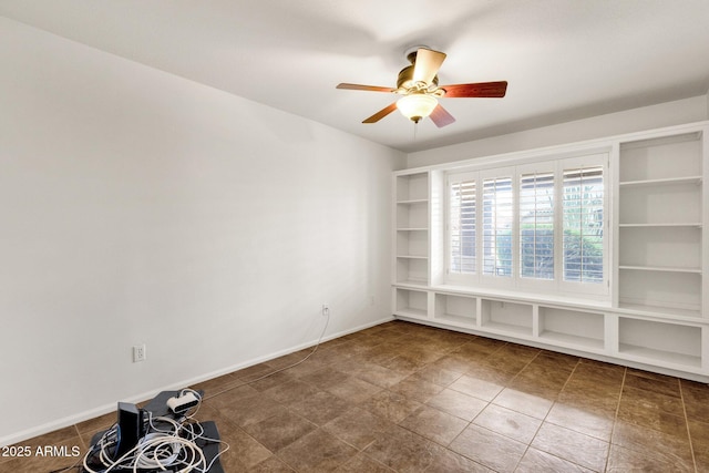 11101 W Wilshire Dr, Avondale, AZ 85392 - empty room with a ceiling fan and baseboards
