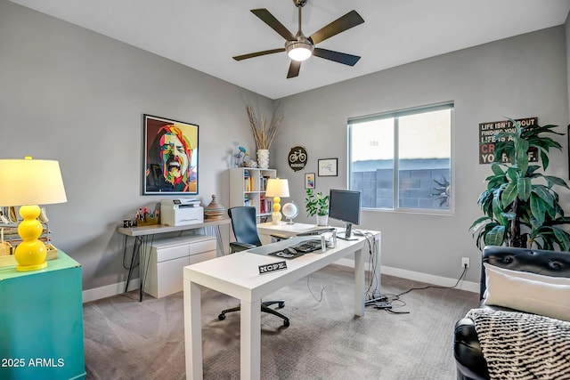 office space with ceiling fan and light carpet