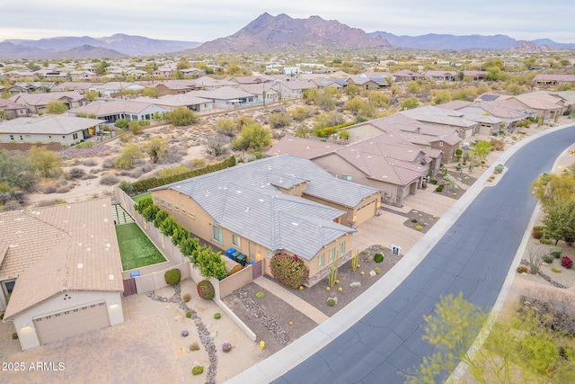 aerial view featuring a mountain view and a residential view