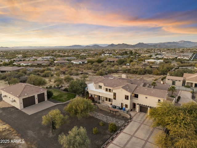 aerial view at dusk with a mountain view