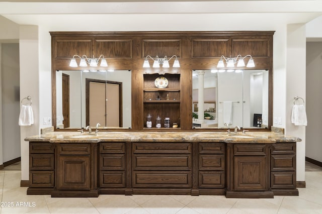 bathroom with vanity and tile patterned floors