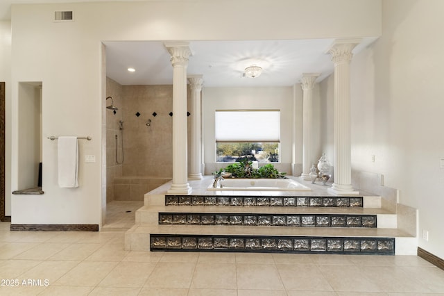 bathroom featuring independent shower and bath, tile patterned flooring, and ornate columns