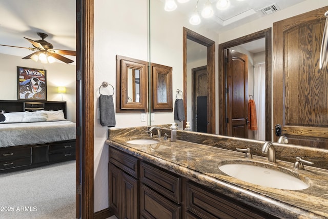 bathroom featuring vanity and ceiling fan