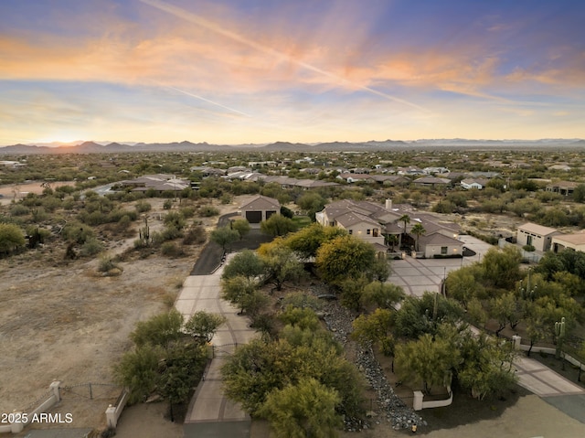 aerial view at dusk with a mountain view