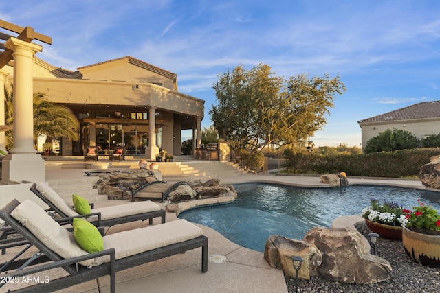 view of pool with a patio