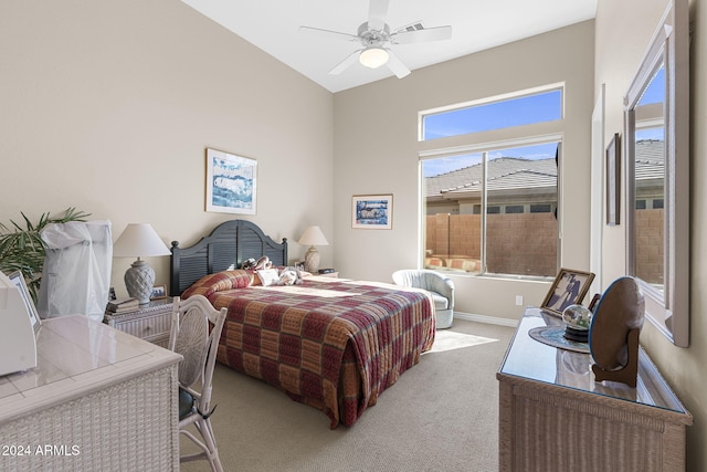 bedroom featuring ceiling fan and light colored carpet