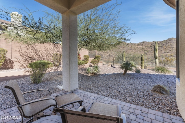 view of patio with a mountain view