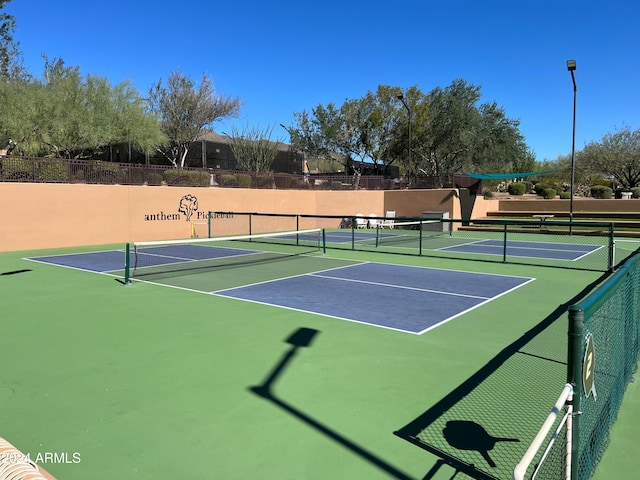 view of sport court featuring basketball hoop