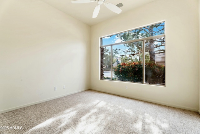 unfurnished room featuring carpet floors and ceiling fan