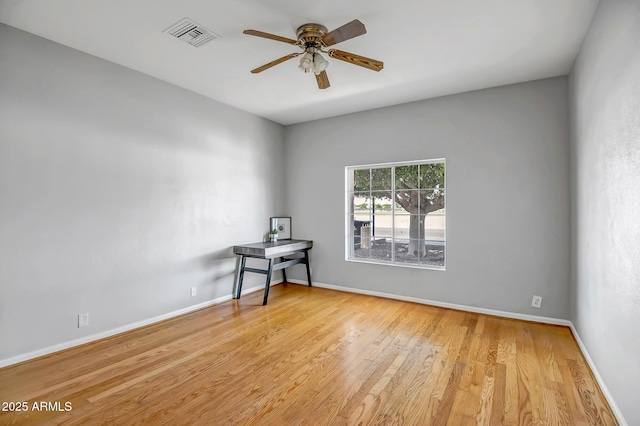 10215 W Missouri Ave, Glendale, AZ 85307 - unfurnished room featuring ceiling fan, wood finished floors, and baseboards