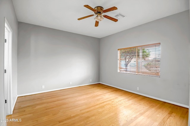 10215 W Missouri Ave, Glendale, AZ 85307 - spare room featuring ceiling fan, light wood-type flooring, and baseboards
