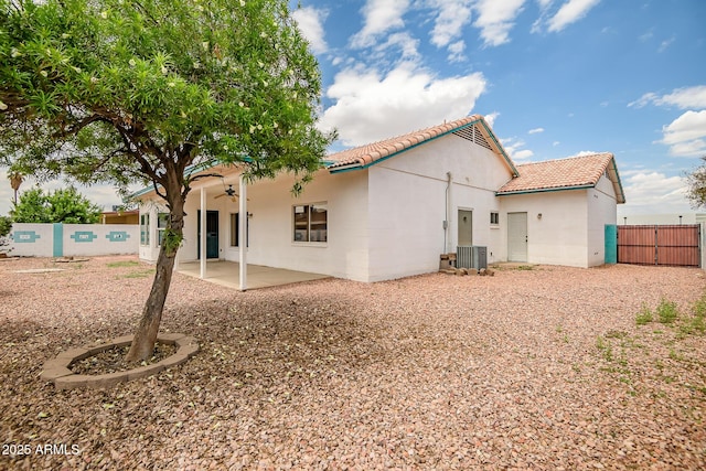 10215 W Missouri Ave, Glendale, AZ 85307 - back of property featuring a tiled roof, fence, a ceiling fan, a patio, and central air condition unit