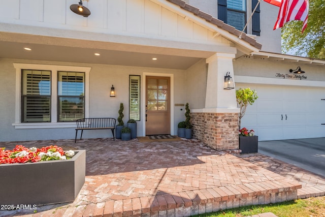 property entrance featuring board and batten siding, covered porch, and stone siding