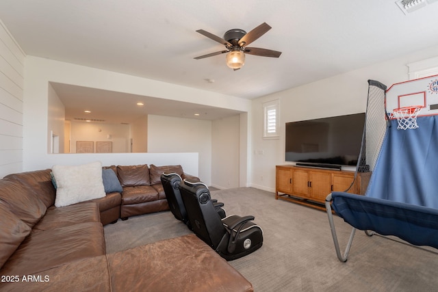 living room featuring ceiling fan, carpet floors, baseboards, and recessed lighting
