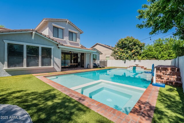view of pool featuring a pool with connected hot tub